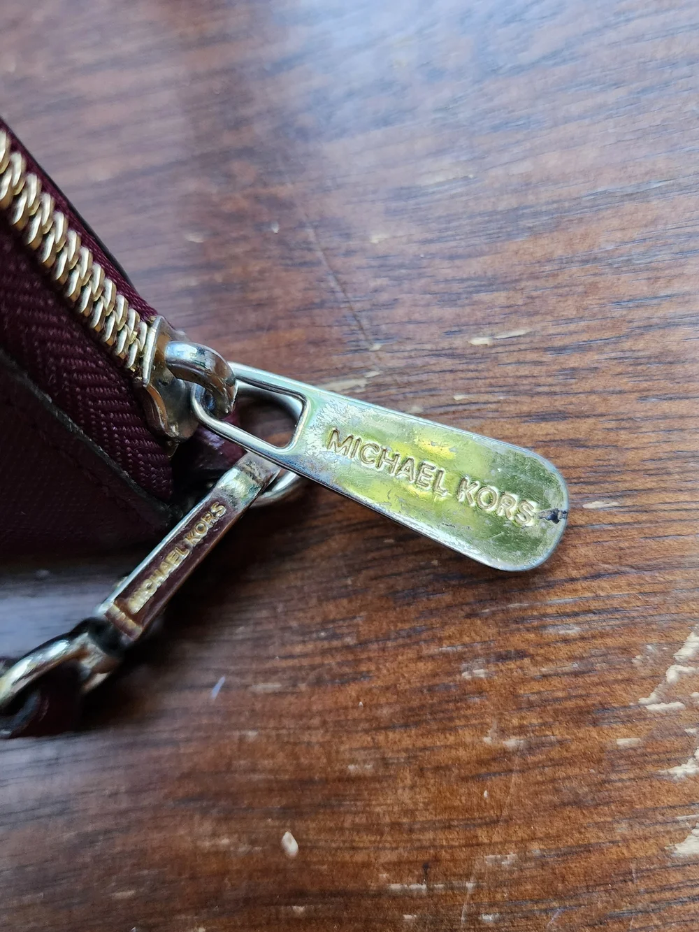 Michael Kors Burgundy Saffiano Leather Zip Around Wristlet Wallet